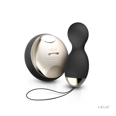 Deux éléments noirs LELO Hula Beads, dont une télécommande ronde à façade argentée et cordon