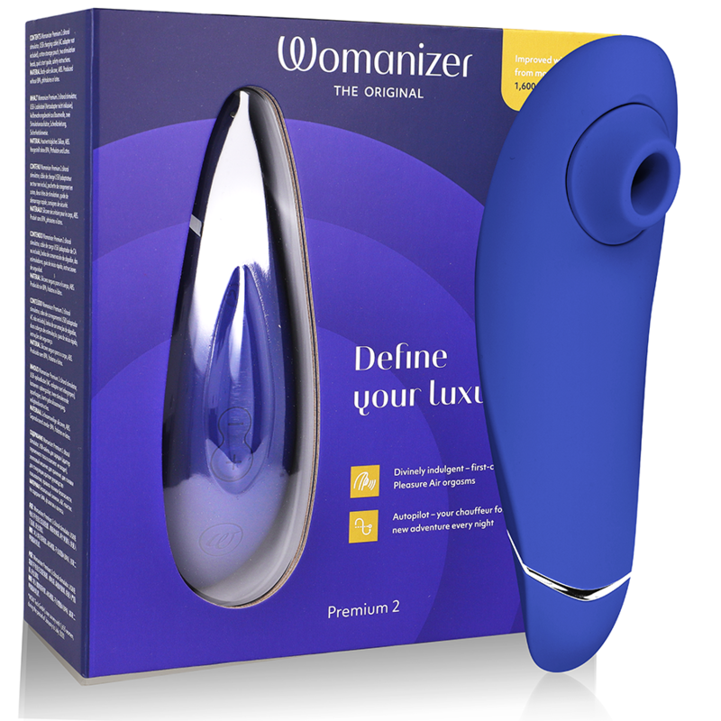 Womanizer Premium 2 Blueberry bleu devant sa boîte violette, embout rond orienté à droite