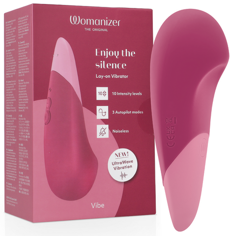 Womanizer Vibe rose devant sa boîte, forme large et pointe arrondie avec panneau rose clair