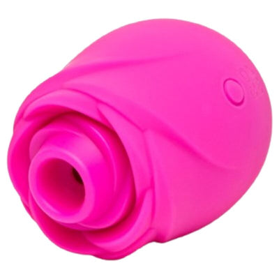 Rose ROMP Rose fuchsia couchée sur le côté, embout circulaire ouvert et bouton sur le corps