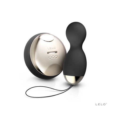 Deux éléments noirs LELO Hula Beads, dont une télécommande ronde à façade argentée et cordon