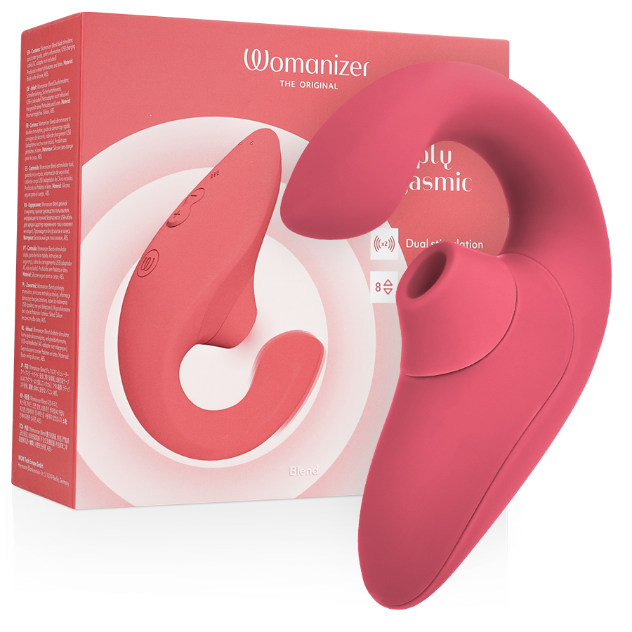 Womanizer Blend rose corail à double branche courbe devant sa boîte saumon, embout circulaire visible