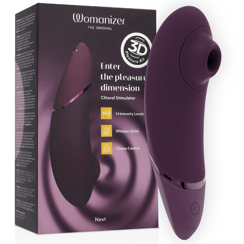 Womanizer Next violet foncé devant sa boîte, embout rond dirigé vers la droite et base mauve
