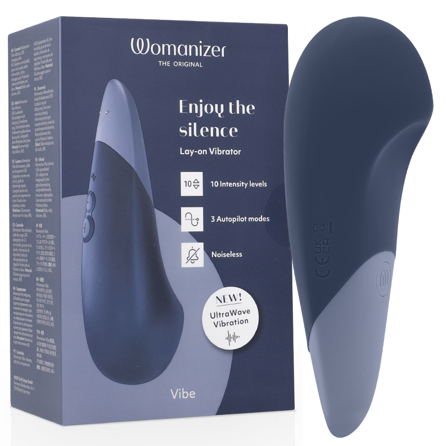 Womanizer Vibe bleu foncé devant sa boîte, forme large et pointe arrondie visible