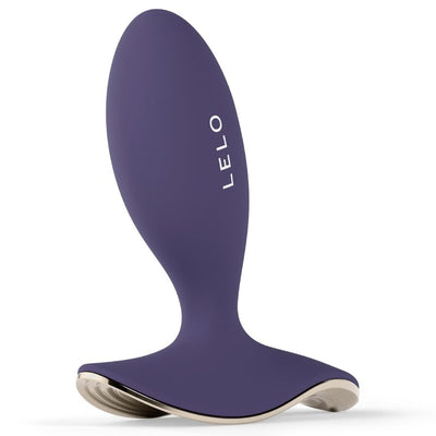 Plug violet LELO Surfer 2 avec partie ovale allongée, base large ondulée et bord métallisé